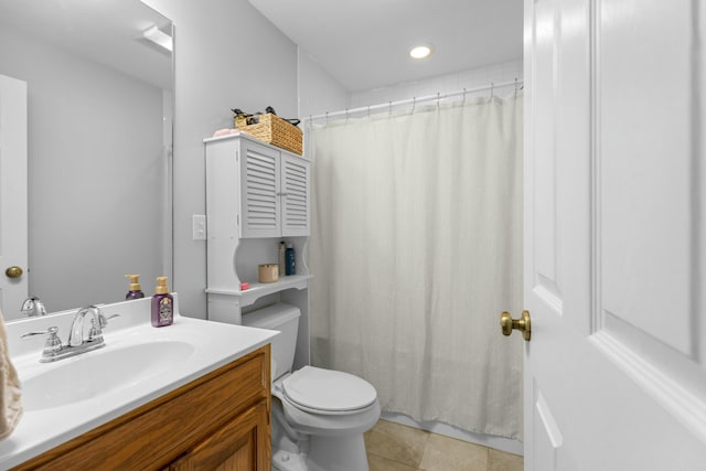 bathroom featuring tile patterned flooring, vanity, toilet, and a shower with curtain