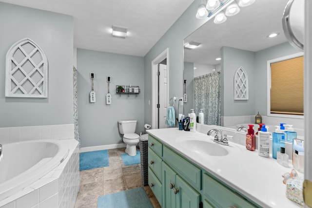 full bathroom featuring separate shower and tub, vanity, and toilet