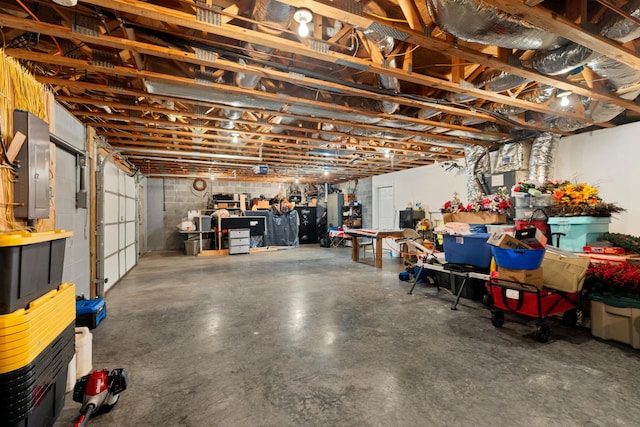 basement featuring electric panel