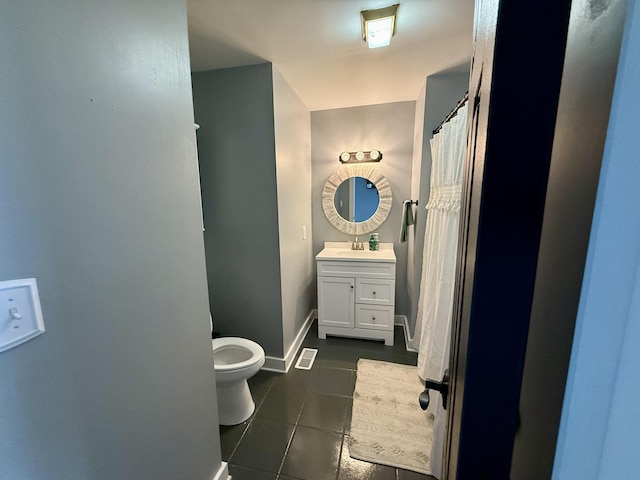 full bathroom with visible vents, toilet, tile patterned flooring, baseboards, and vanity