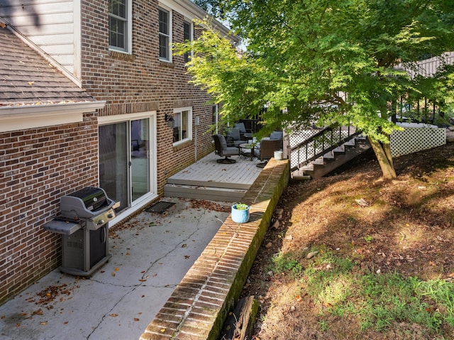 exterior space with a patio and a grill