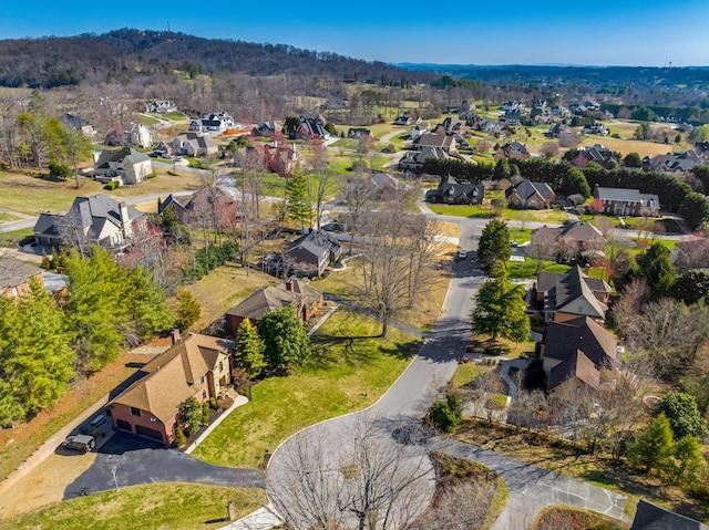 birds eye view of property with a residential view