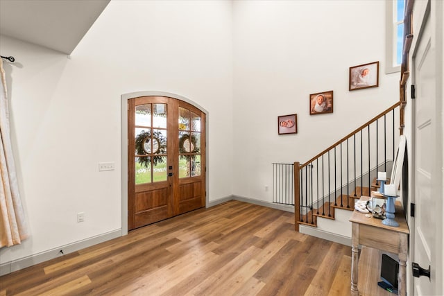 entryway featuring french doors and hardwood / wood-style floors