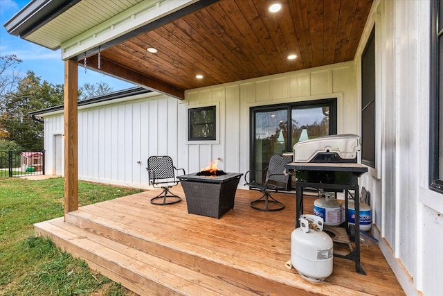 deck with an outdoor fire pit