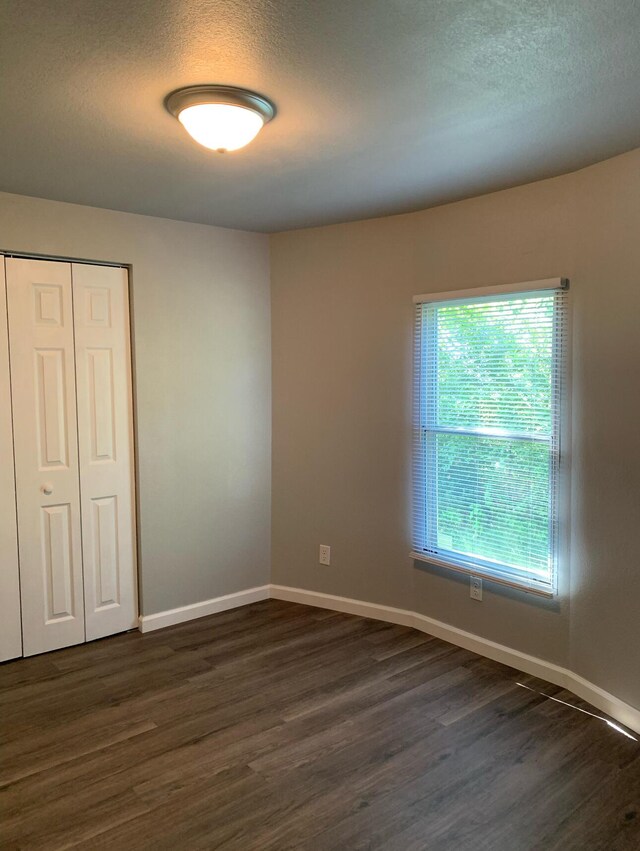 1322 Sager Rd, Dandridge, TN 37725 - spare room featuring dark wood finished floors and baseboards
