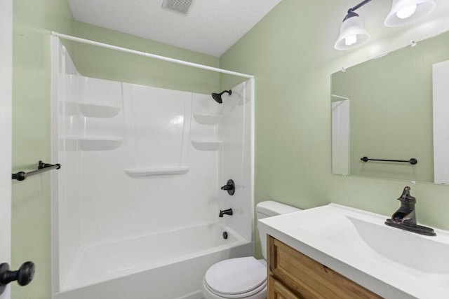 full bathroom featuring visible vents, toilet, and vanity