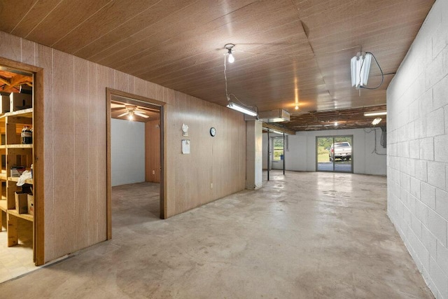 garage featuring concrete block wall