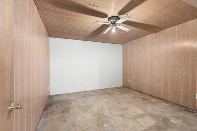 empty room with unfinished concrete flooring and ceiling fan