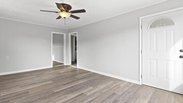 1501 Cherry Bottom Rd, Caryville, TN 37714 - spare room with ceiling fan, wood-type flooring, and ornamental molding