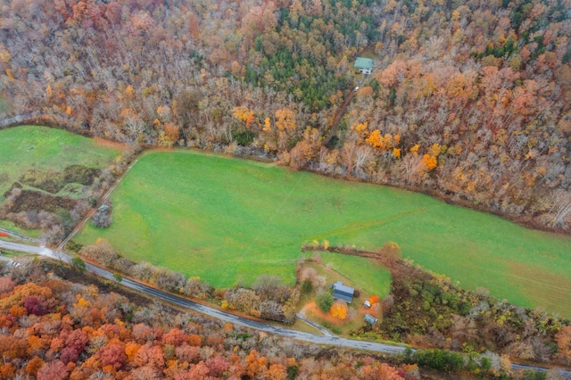 birds eye view of property featuring a rural view