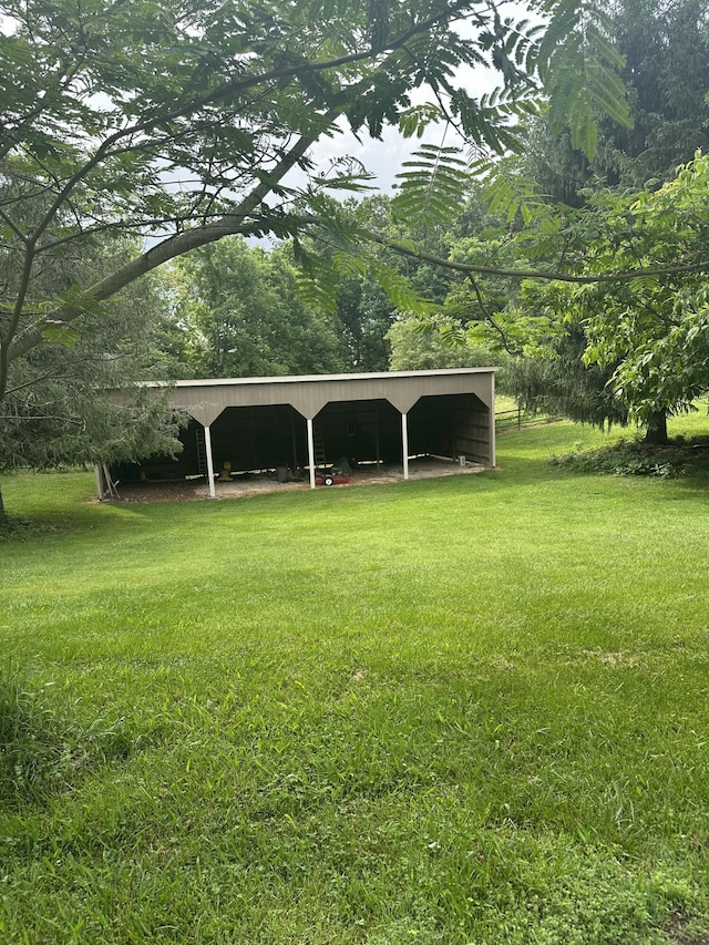 3041 Wineberry Ln, Morristown, TN 37814 - view of property's community with a pole building, a yard, and a carport