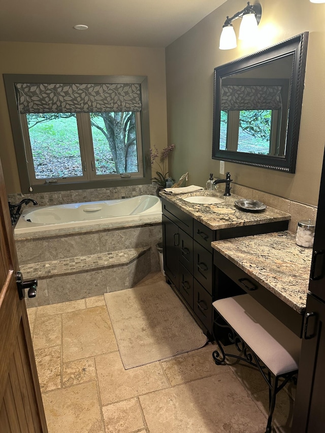 3041 Wineberry Ln, Morristown, TN 37814 - full bath featuring stone tile flooring, vanity, and a garden tub