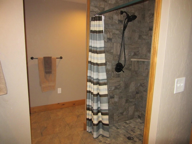 3041 Wineberry Ln, Morristown, TN 37814 - bathroom with tiled shower and baseboards
