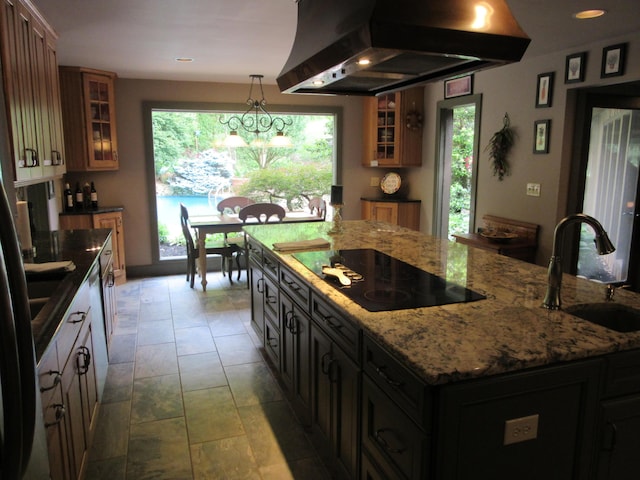 3041 Wineberry Ln, Morristown, TN 37814 - kitchen featuring a sink, black electric stovetop, wall chimney exhaust hood, glass insert cabinets, and recessed lighting