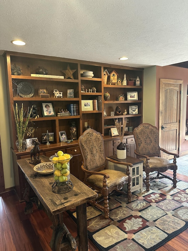 3041 Wineberry Ln, Morristown, TN 37814 - living area featuring a textured ceiling, wood finished floors, and recessed lighting