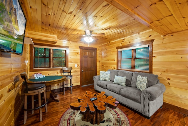 living room with dark hardwood / wood-style flooring and wood ceiling