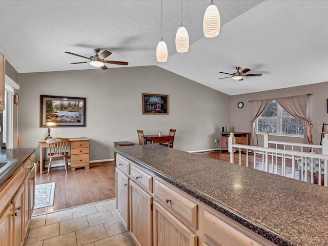 kitchen with decorative light fixtures, ceiling fan, light tile patterned flooring, and light brown cabinets