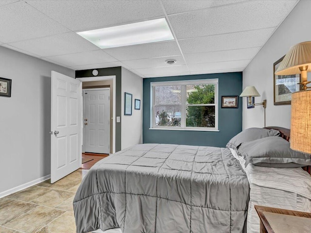 bedroom with a drop ceiling