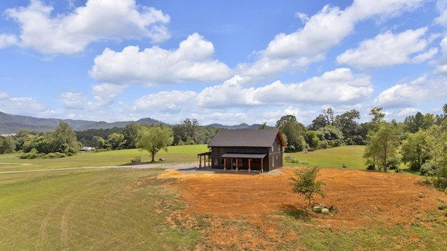 view of mountain feature featuring a rural view