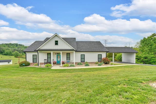 modern inspired farmhouse featuring covered porch, a shingled roof, a front lawn, and board and batten siding