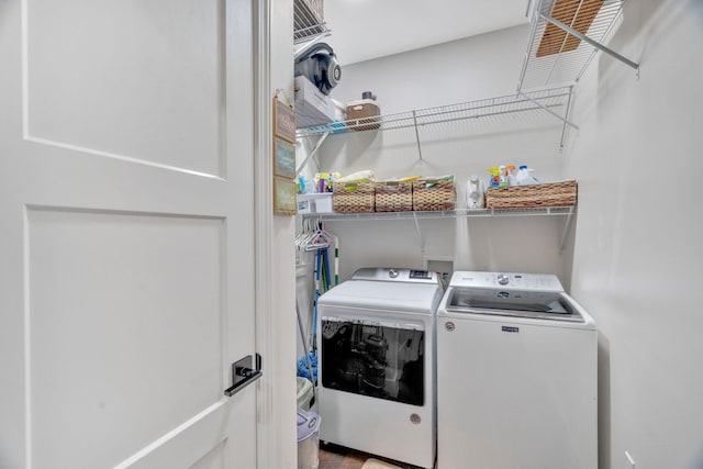 washroom featuring independent washer and dryer