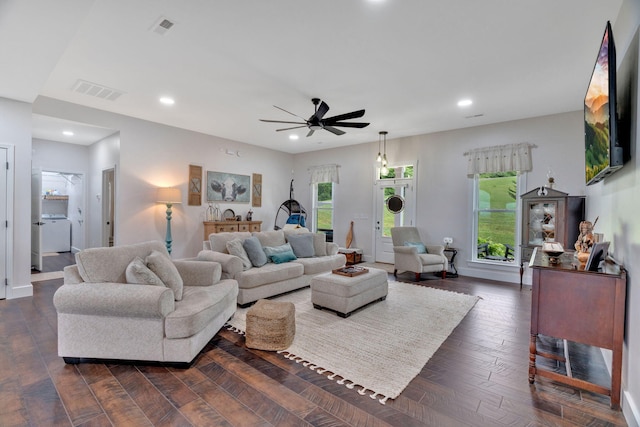 living room with a ceiling fan, recessed lighting, and dark wood finished floors