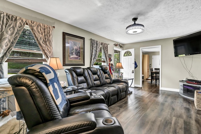 1651 Old Liberty Hill Rd, Morristown, TN 37814 - living area with wood finished floors, a textured ceiling, and baseboards