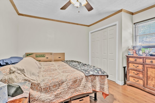 1651 Old Liberty Hill Rd, Morristown, TN 37814 - bedroom with light wood-type flooring, ornamental molding, a closet, and a ceiling fan