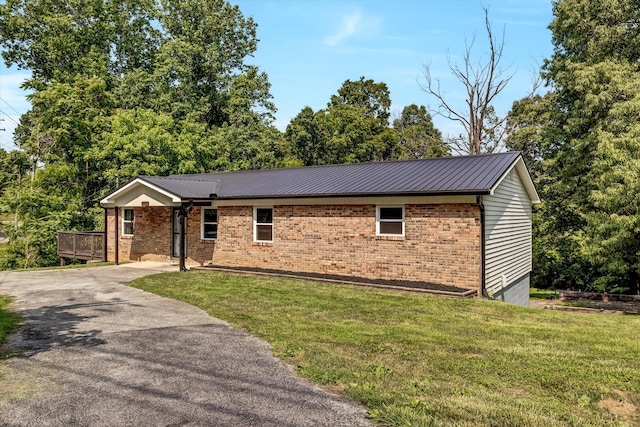 1651 Old Liberty Hill Rd, Morristown, TN 37814 - view of front facade with a front lawn, brick siding, and metal roof