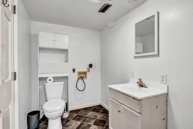 1651 Old Liberty Hill Rd, Morristown, TN 37814 - bathroom with toilet, vanity, and baseboards