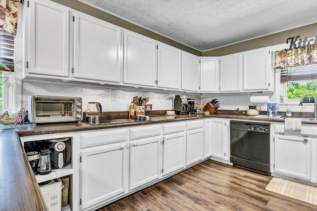 1651 Old Liberty Hill Rd, Morristown, TN 37814 - kitchen featuring black dishwasher, dark countertops, white cabinets, wood finished floors, and a sink