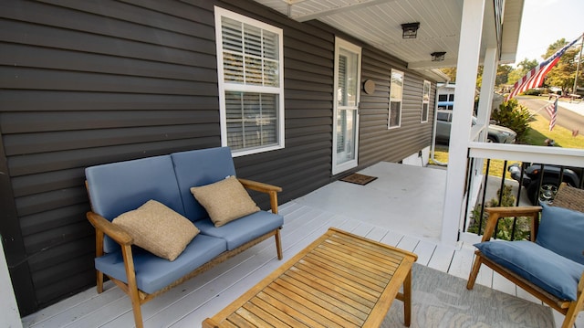 wooden deck featuring covered porch