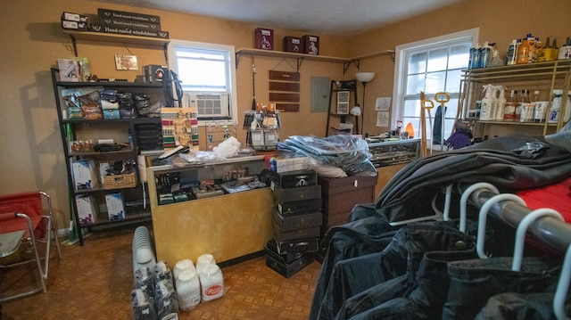 miscellaneous room featuring cooling unit and parquet floors