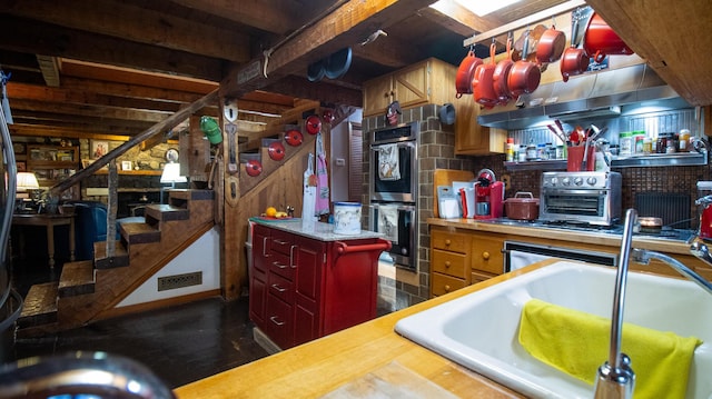 kitchen featuring sink and double oven