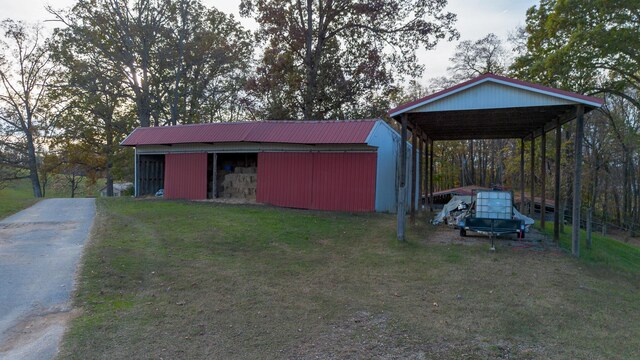 view of outdoor structure with a yard