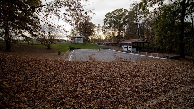 view of yard at dusk