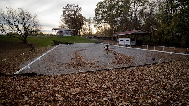 view of yard at dusk