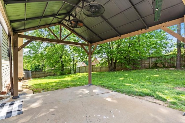 view of patio featuring a ceiling fan, a fenced backyard, and central AC