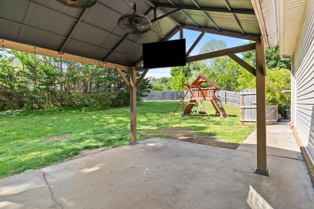 view of patio / terrace featuring a fenced backyard and a playground