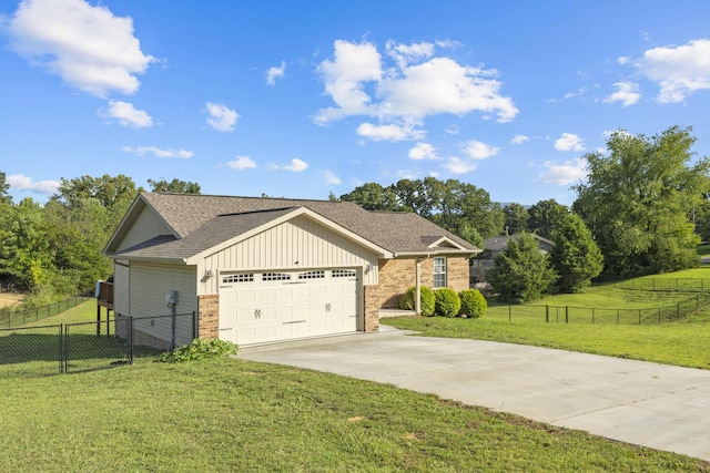 411 Mckinney Dr, Sevierville, TN 37876 - view of front of home with fence, an attached garage, brick siding, driveway, and a front yard