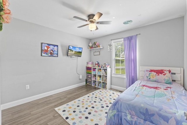 411 Mckinney Dr, Sevierville, TN 37876 - bedroom with ceiling fan, baseboards, and wood finished floors