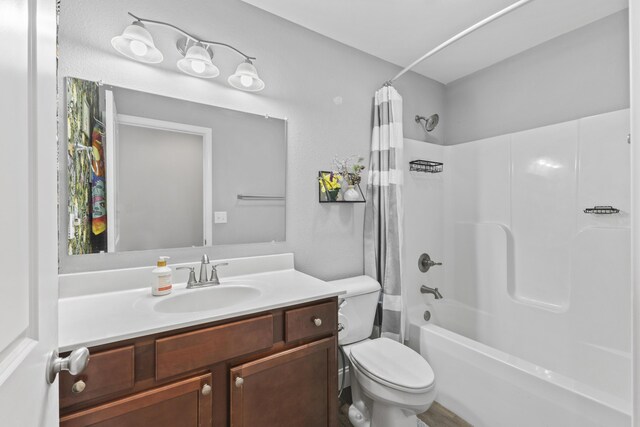 411 Mckinney Dr, Sevierville, TN 37876 - full bathroom with vanity, toilet, and shower / bathtub combination with curtain