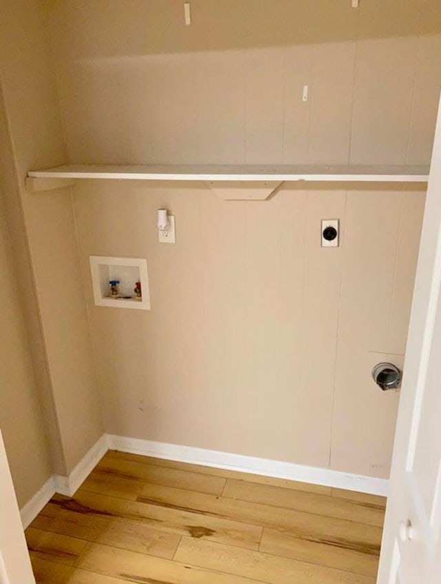 washroom with electric dryer hookup, wood-type flooring, and hookup for a washing machine