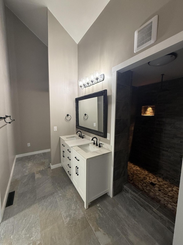 2157 Windy Cove Ln, Talbott, TN 37877 - bathroom featuring lofted ceiling, double vanity, and walk in shower