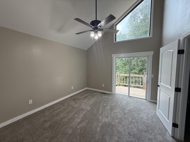 2157 Windy Cove Ln, Talbott, TN 37877 - empty room with ceiling fan, carpet flooring, and high vaulted ceiling