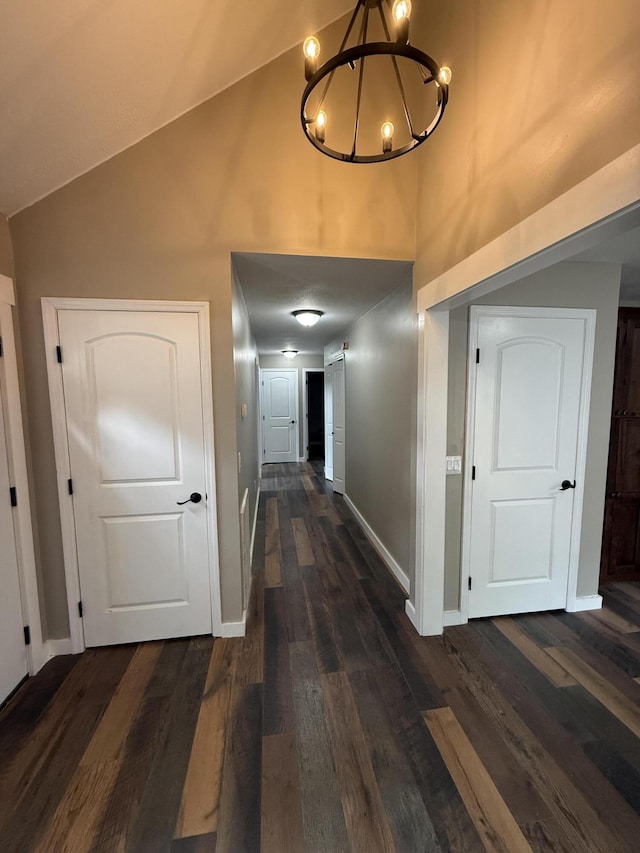 2157 Windy Cove Ln, Talbott, TN 37877 - corridor featuring a chandelier, dark wood finished floors, and high vaulted ceiling