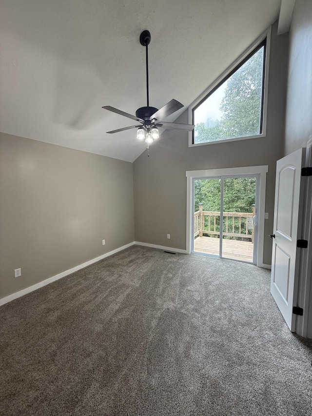 2157 Windy Cove Ln, Talbott, TN 37877 - empty room with carpet floors, ceiling fan, and high vaulted ceiling