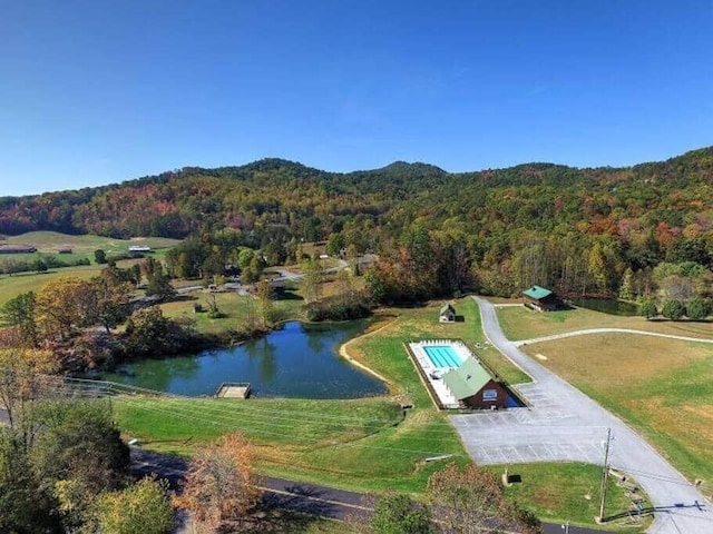 surrounding community featuring a water view