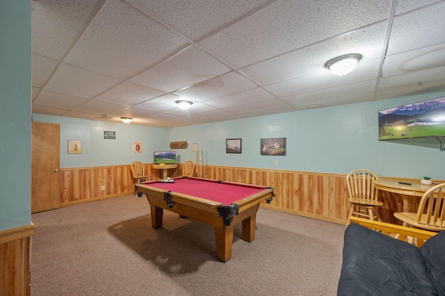 playroom with carpet, a paneled ceiling, pool table, and wood walls