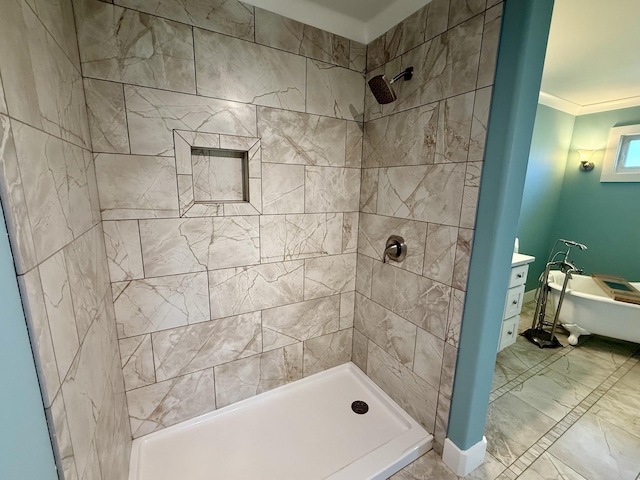 full bath featuring baseboards, tiled shower, a soaking tub, and crown molding